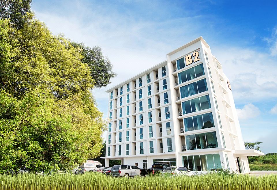 ห้องพักแอร์สไตล์เรียบสะอาดของ B2 Phrae โทนสีอบอุ่น เตียงนอนสบาย