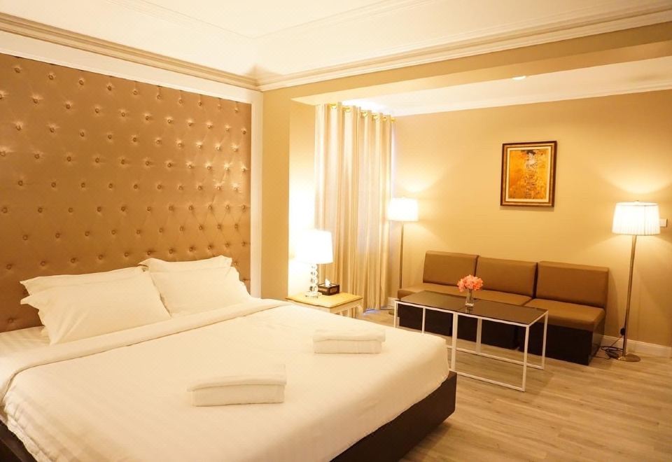 ห้องพักของ Taris Art Hotel Phrae ตกแต่งเรียบ เตียงใหญ่ สะอาด