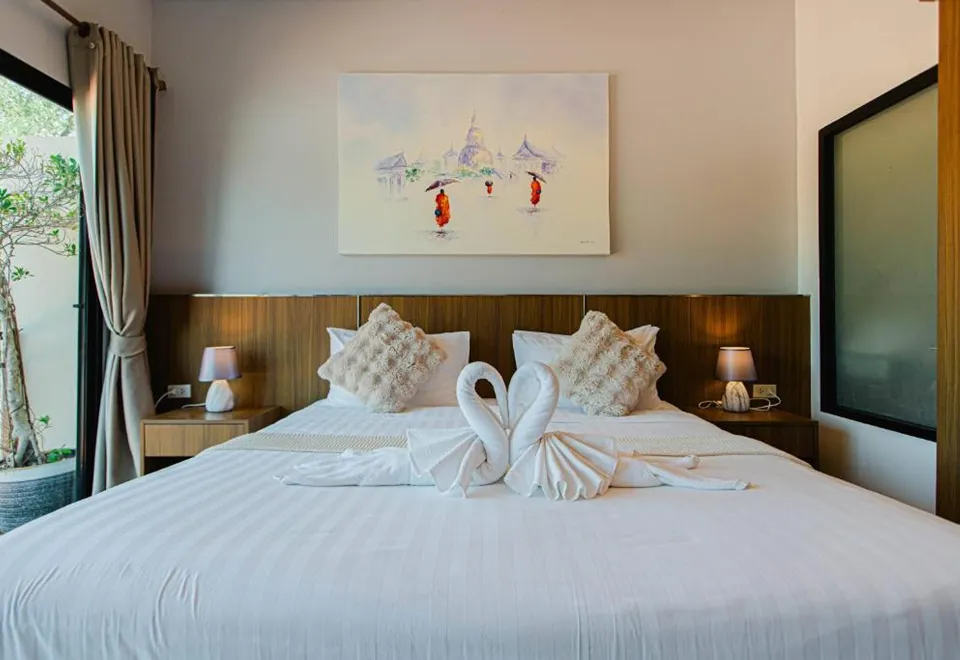 ห้องพักสไตล์อพาร์ตเมนต์ของ The Happy Eight Resort พร้อมครัวและมุมนั่งเล่น