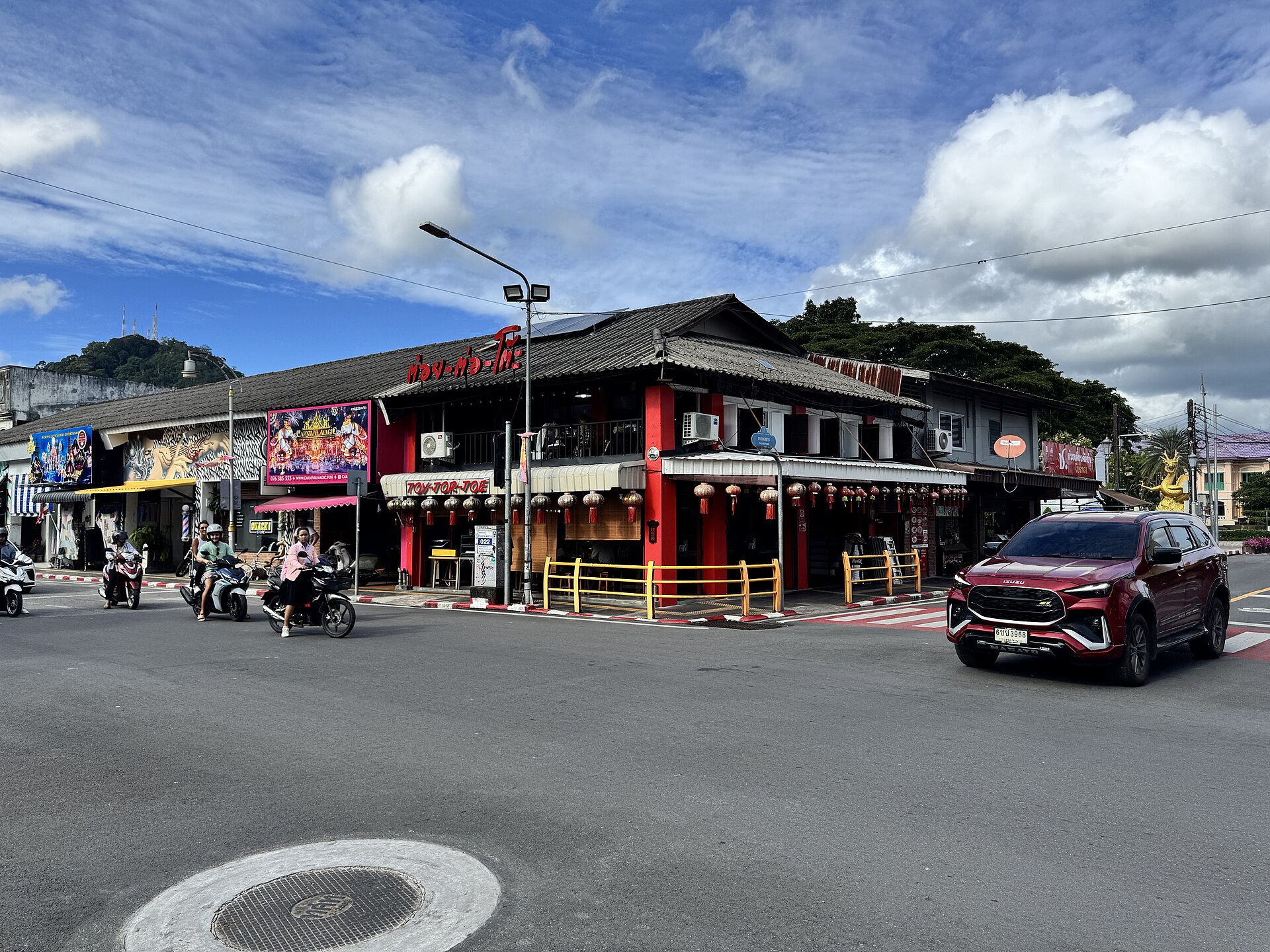 A street scene in Old Phuket Town with Sino-Portuguese shophouses and shopfronts along the road in Phuket City