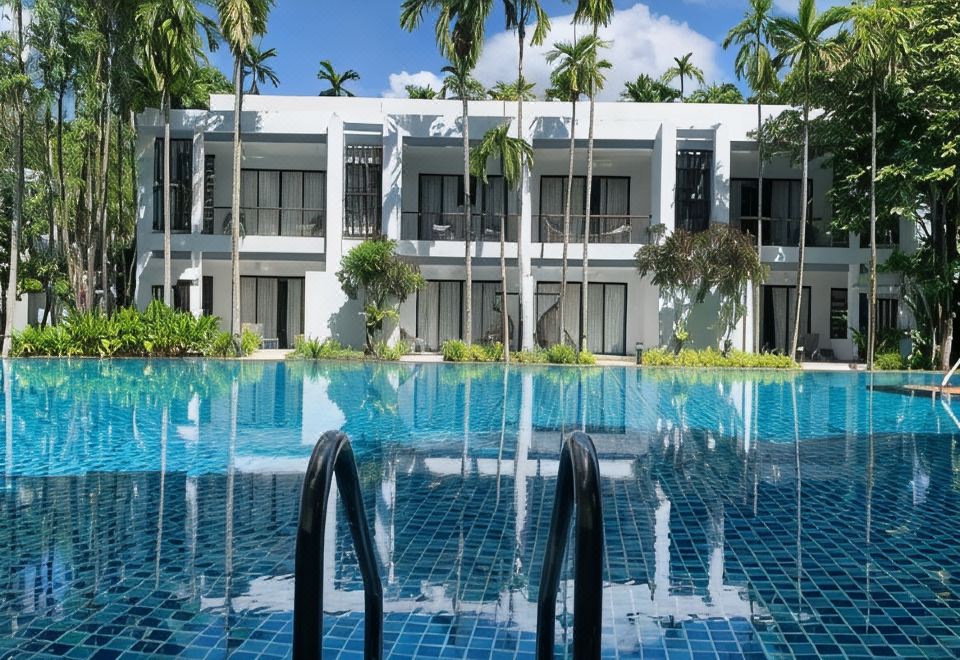 ห้องพักของ Siamdasada Khaoyai เตียงใหญ่ มีระเบียงมองออกไปเห็นสวน