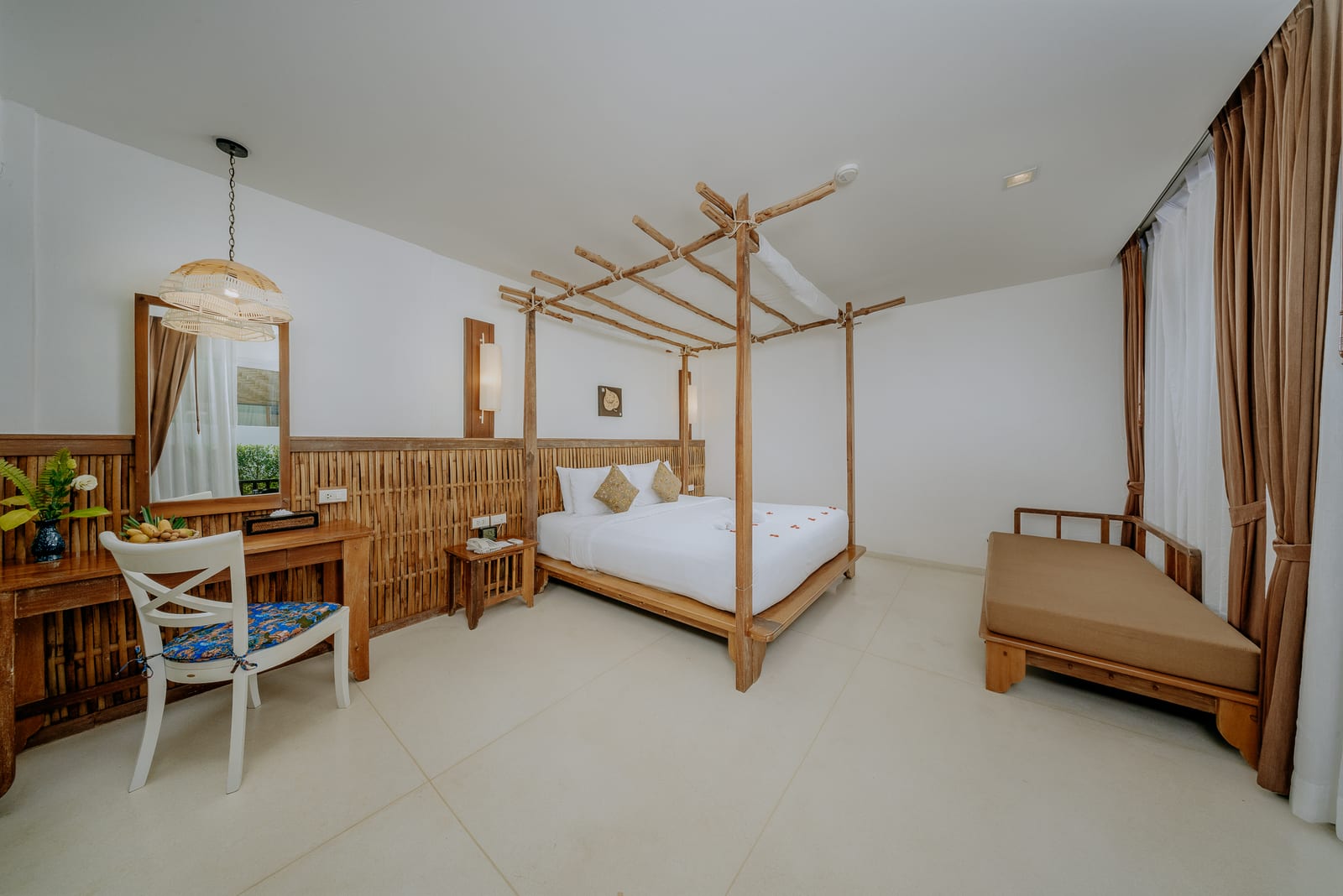 The limestone cliff backdrop and beach at Railay Bay Resort on the Railay peninsula