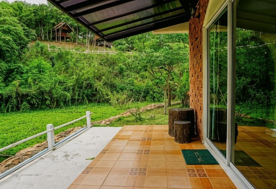 ห้องพักภายใน Dandelion Resort สวนผึ้ง ตกแต่งเรียบง่ายโทนอบอุ่นพร้อมพื้นที่นั่งเล่น