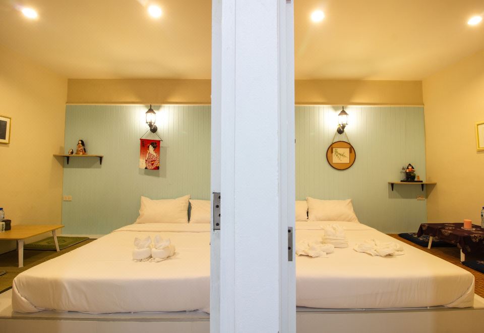 ห้องพักของ The Bed Boutique House ราชบุรี ตกแต่งเรียบง่าย เตียงสะอาด