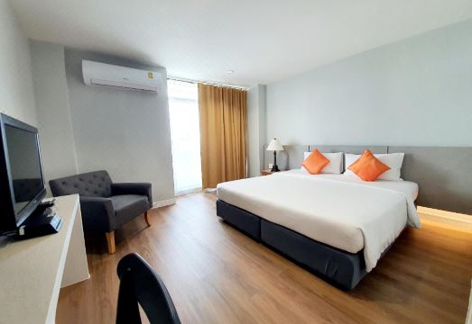 ห้องพักของ The Majestic Sakon Nakhon โทนเรียบ เตียงนอนสบาย
