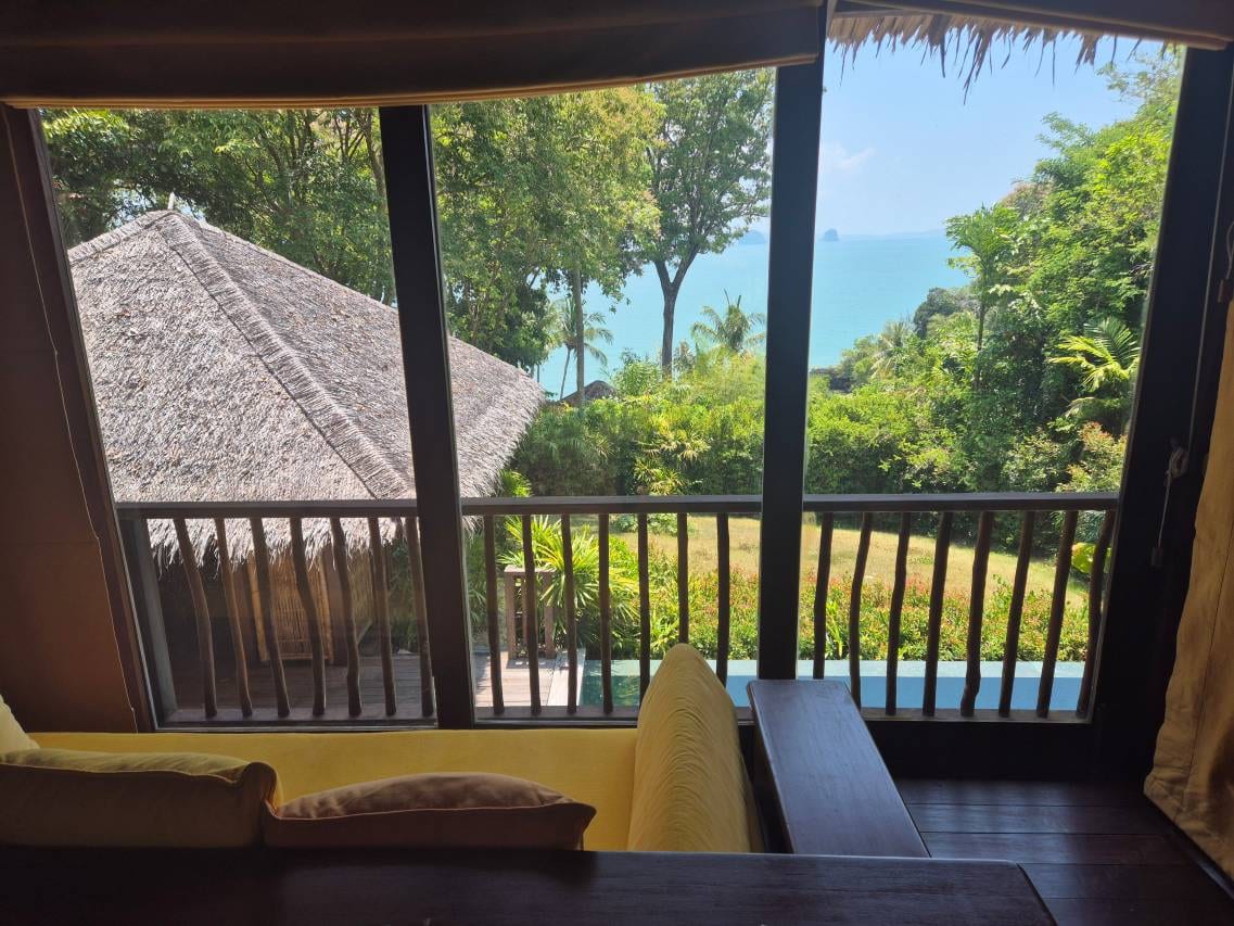 The Hilltop infinity pool at Six Senses Yao Noi looking out over Phang Nga Bay and its limestone cliffs