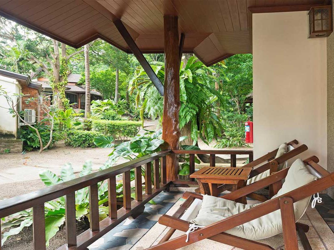 Tropical garden villas at Sunrise Tropical Resort Railay among the coconut groves