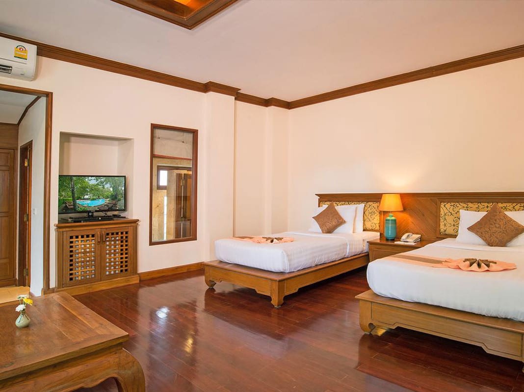Outdoor swimming pool and garden area at Sunrise Tropical Resort in Railay, Krabi