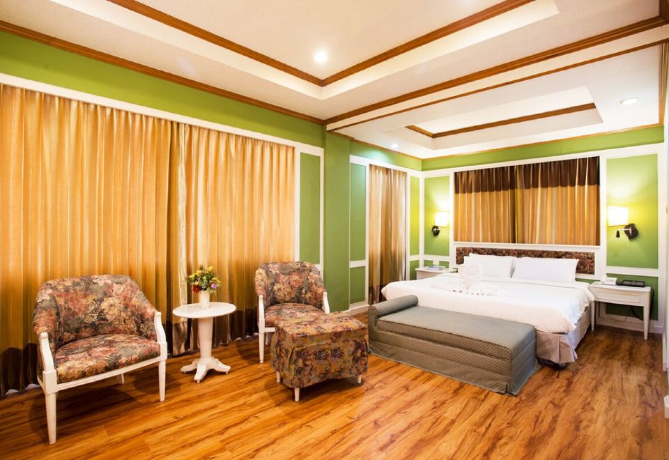 ห้องพักของ Wangtai Hotel สุราษฎร์ธานี เตียงคู่ พื้นที่กว้าง