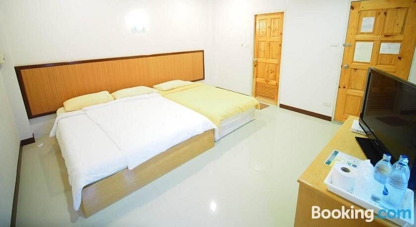 ห้องพักของบ้านปู๋ย่า รีสอร์ต พร้อมแอร์ ทีวี และห้องน้ำส่วนตัว