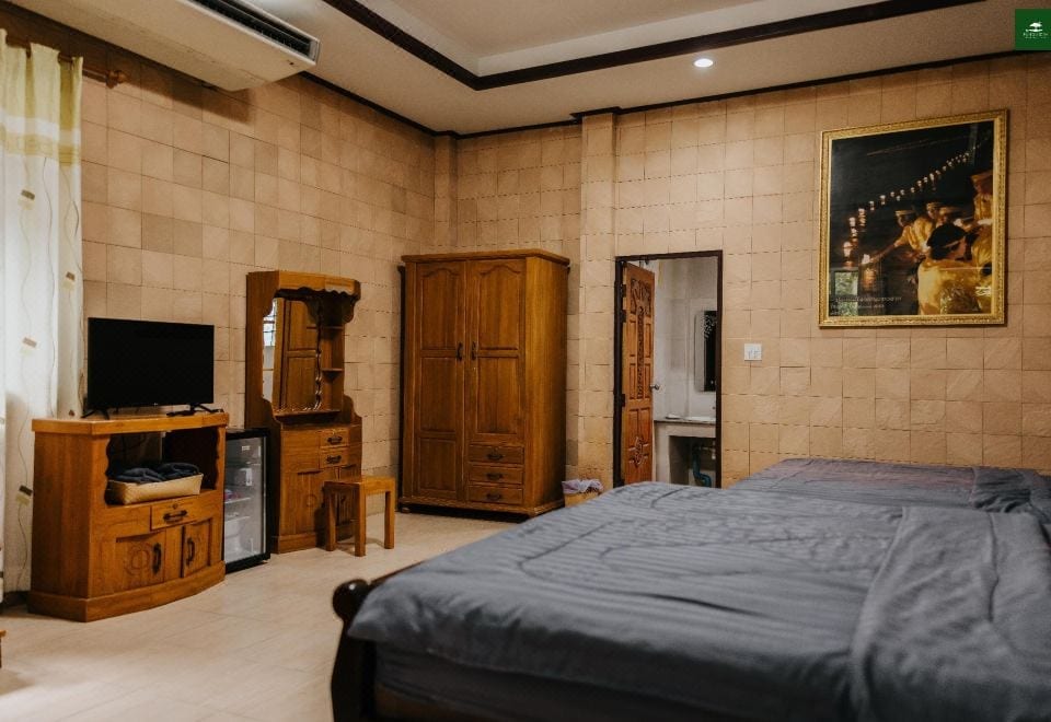 ห้องพักริมน้ำของ Pingview Villa Resort พร้อมระเบียงมองวิวแม่น้ำปิง