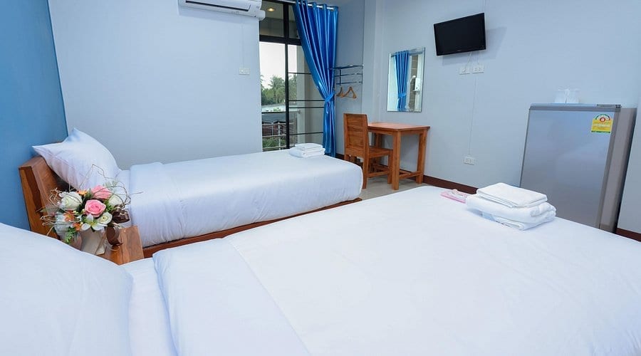 ห้องพักของ T.House Maesot สะอาด เตียงคู่ พร้อมระเบียงส่วนตัว