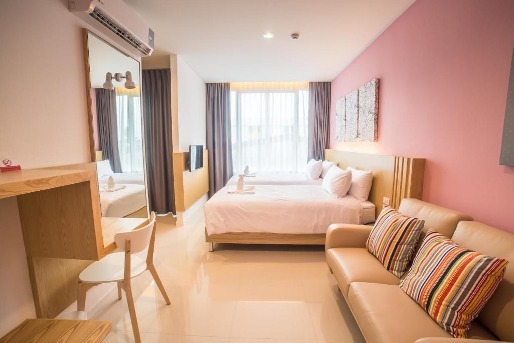 ห้อง Superior Twin Room ของ The Bliss Ubon สะอาดกว้างพร้อมเตียงเดี่ยวสองเตียง