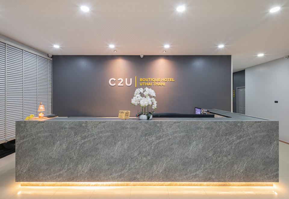 มุมห้องพักและสิ่งอำนวยความสะดวกของ C2U Hotel Uthai Thani